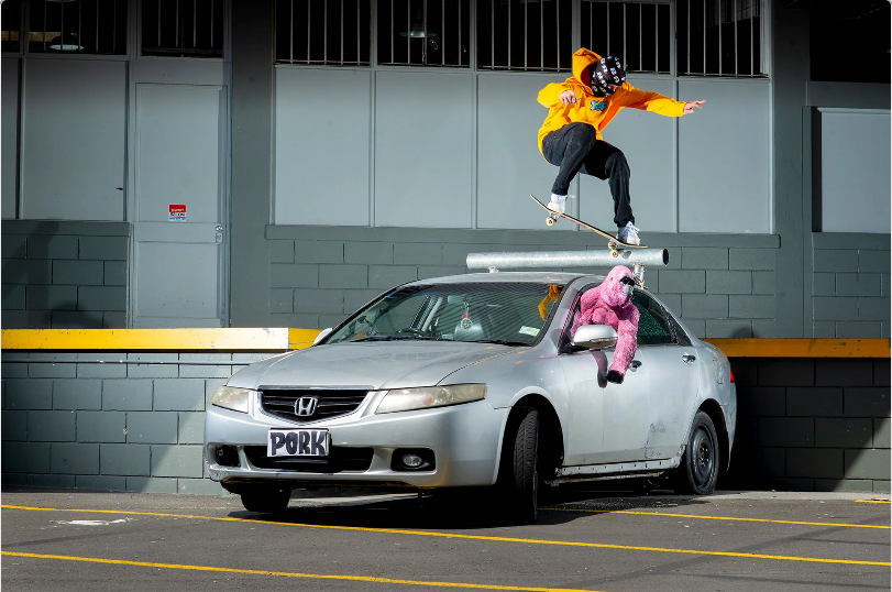 DEF x PORK skateboarder over the Porkmobile