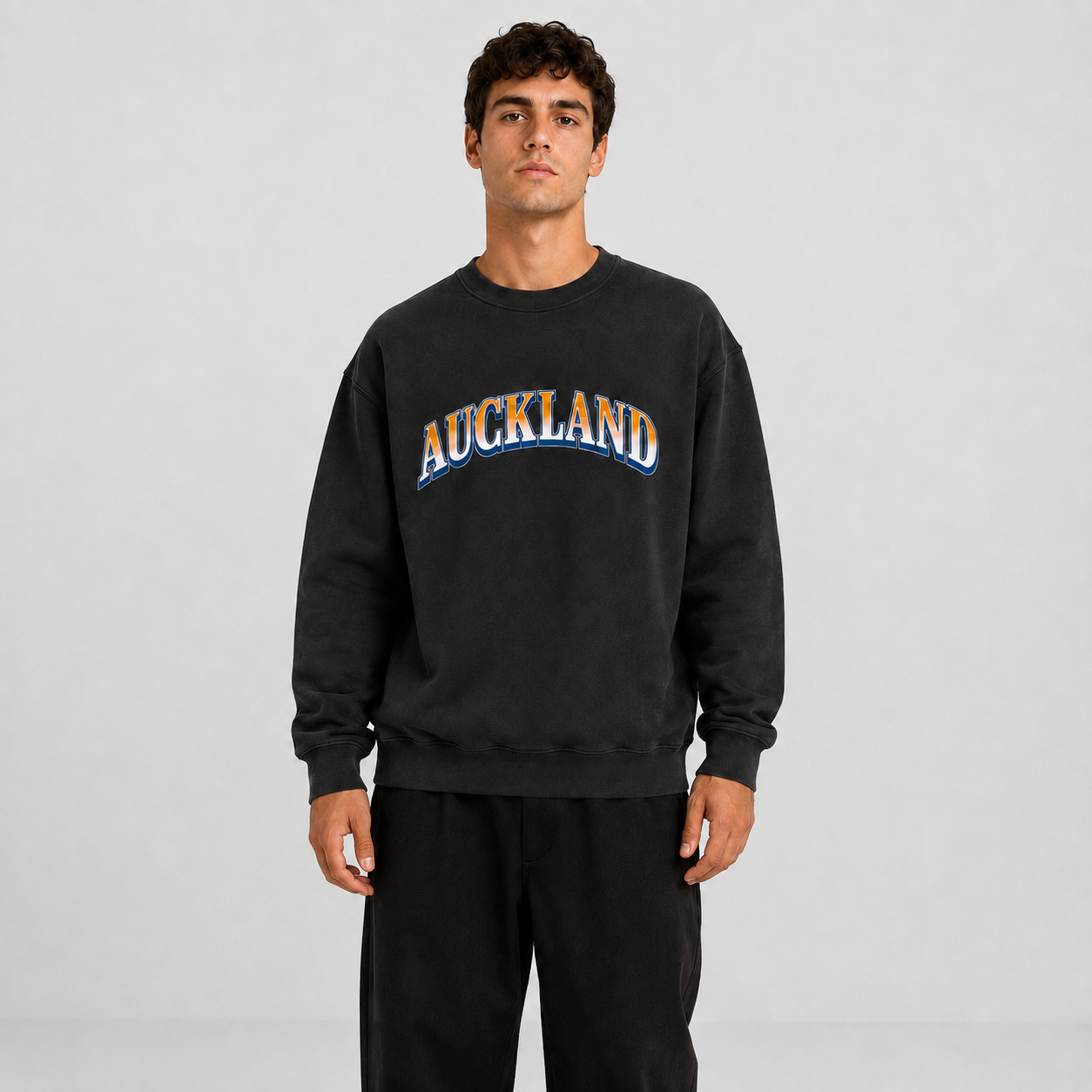 Model wearing Auckland Arch Crew Faded Black