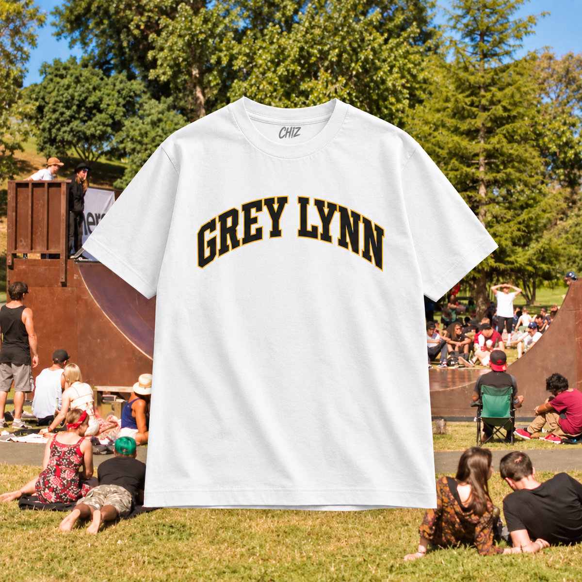 Grey Lynn Arch white tee at Grey Lynn skatepark with CHIZ inside neck branding